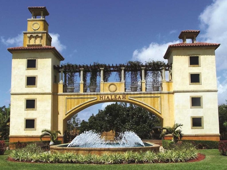 Hialeah entrance landmark with fountain and Mediterranean-style towers