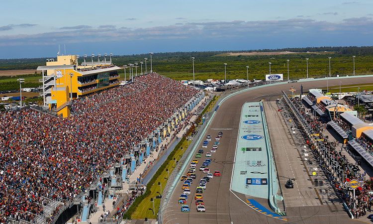 Race cars and grandstands at Homestead-Miami Speedway