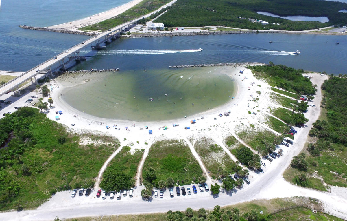 Aerial view of Sebastian Inlet State Park, bridge, lagoon, and Atlantic shoreline